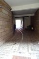 Hauseingang <!--LINK'" 0:19--> mit alten Rollwagengleise zum Warentransport für den ehemaligen Betrieb im Hinterhof, März 2020