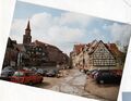 Blick auf den Heiligenberg und die [[Heiligenstraße]] mit [[Kirche St. Michael]], [[Schrödershof]]  und Schulgebäude [[Kirchenplatz 2 / 2a]] im April 1998