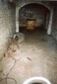 Besichtigung des Luftschutzbunkers und <!--LINK'" 0:90--> mit alter Lore, Lüftungskanalbogen und verrotteten Biergartenklappstuhl am 17. Juli 2004