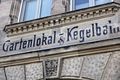alte Fassadenbeschriftung über dem Hauseingang Anwesen <!--LINK'" 0:53--> im Juni 2020 der früheren hier befindlichen Gaststätte (Stadt Bamberg). Im Adressbuch 1931 ist der Wirt Hermann Kühn, wohnhaft im 1. Stock, aufgeführt.
