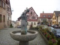 Der Brestlasbrunnen in <!--LINK'" 0:26--> von <a class="mw-selflink selflink">Gudrun Kunstmann</a>