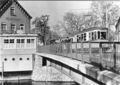 Postkarte von 2003 mit Ansicht von 1953 der <a class="mw-selflink selflink">Maxbrücke</a>, der längst abgerissenen Gaststätte <!--LINK'" 0:25--> und einer von der <!--LINK'" 0:26--> kommenden Straßenbahn Typ 907 Bj. 1940