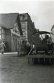 Die Firma Reifen-Reichel in der Langen Straße, im Hintergrund das Gebäude Finkenstraße 6 d, 1955