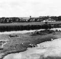 Foto von der Vacher Regnitzbrücke auf die <!--LINK'" 0:50-->, im Hintergrund das Panorama von <!--LINK'" 0:51--> ca. <a class="mw-selflink selflink">1930</a>