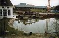 Stau- und Triebwerksanlage an der Foerstermühle - im Hintergrund die Stadthalle, Jan. 1989