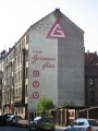 Gemalte Reklame der <a class="mw-selflink selflink">Brauerei Geismann</a> auf dem Gebäude Holzstraße 45