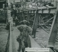 Vorrücken der US Kompanie K 222 d zum Rathaus über die zerstörte Maxbrücke am 19. April 1945. Im ... <span class="smw-highlighter" data-type="8" data-state="inline" data-title="Hinweis" title="Vorrücken der US Kompanie K 222 d zum Rathaus über die zerstörte Maxbrücke am 19. April 1945. Im Bild gefangene Deutsche Soldaten auf dem Weg in die Stadt zurück.Urheber: Sgt. William R. Hazard &amp; Cpl. Clifford LohsLizenz: CC BY-SA 3.0"><span class="smwtticon note"></span><span class="smwttcontent">Vorrücken der US Kompanie K 222 d zum Rathaus über die zerstörte Maxbrücke am 19. April 1945. Im Bild gefangene Deutsche Soldaten auf dem Weg in die Stadt zurück.<br>Urheber: Sgt. William R. Hazard & Cpl. Clifford Lohs<br><br>Lizenz: CC BY-SA 3.0</span></span>