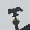 Adler auf der Fahnenstange des Gebäudes <!--LINK'" 0:4-->, Oktober 2025 <span class="smw-highlighter" data-type="8" data-state="inline" data-title="Hinweis" title="Urheber: LadyJLizenz: copyright"><span class="smwtticon note"></span><span class="smwttcontent">Urheber: LadyJ<br><br>Lizenz: copyright</span></span>