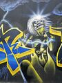 Graffiti in der <!--LINK'" 0:7--> <a class="mw-selflink selflink">Kapellenstraße</a>, Dezember 2025 <span class="smw-highlighter" data-type="8" data-state="inline" data-title="Hinweis" title="Urheber: LadyJLizenz: copyright"><span class="smwtticon note"></span><span class="smwttcontent">Urheber: LadyJ<br><br>Lizenz: copyright</span></span>
