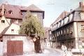 Blick vom Lilienplatz in die Theaterstraße bis zur Mohrenstraße; 1969 <span class="smw-highlighter" data-type="8" data-state="inline" data-title="Hinweis" title="Urheber: Leonhard WittmannLizenz: CC BY-SA 3.0"><span class="smwtticon note"></span><span class="smwttcontent">Urheber: <!--LINK'" 0:232--><br><br>Lizenz: CC BY-SA 3.0</span></span>