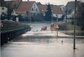 Hochwasser in Vach, Fußgängersteg nach Mannhof, die Brückenstraße unter Wasser mit zu mutigen ... <span class="smw-highlighter" data-type="8" data-state="inline" data-title="Hinweis" title="Hochwasser in Vach, Fußgängersteg nach Mannhof, die Brückenstraße unter Wasser mit zu mutigen Autofahrer Feb. 1987. Heute steht hier der hochgelegte Talübergang BrückenstraßeUrheber: Klaus-Peter SchaackLizenz: CC BY-SA 3.0"><span class="smwtticon note"></span><span class="smwttcontent">Hochwasser in Vach, Fußgängersteg nach Mannhof, die Brückenstraße unter Wasser mit zu mutigen Autofahrer Feb. 1987. Heute steht hier der hochgelegte <!--LINK'" 0:274--><br>Urheber: <!--LINK'" 0:275--><br><br>Lizenz: CC BY-SA 3.0</span></span>