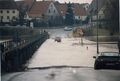 Hochwasser in Vach, Fußgängersteg nach Mannhof, die Brückenstraße unter Wasser mit mutigen ... <span class="smw-highlighter" data-type="8" data-state="inline" data-title="Hinweis" title="Hochwasser in Vach, Fußgängersteg nach Mannhof, die Brückenstraße unter Wasser mit mutigen Autofahrern (der Porsche Fahrer überlegt noch) im Feb. 1987. Heute steht hier der hochgelegte Talübergang BrückenstraßeUrheber: Klaus-Peter SchaackLizenz: CC BY-SA 3.0"><span class="smwtticon note"></span><span class="smwttcontent">Hochwasser in Vach, Fußgängersteg nach Mannhof, die Brückenstraße unter Wasser mit mutigen Autofahrern (der Porsche Fahrer überlegt noch) im Feb. 1987. Heute steht hier der hochgelegte <!--LINK'" 0:272--><br>Urheber: <!--LINK'" 0:273--><br><br>Lizenz: CC BY-SA 3.0</span></span>